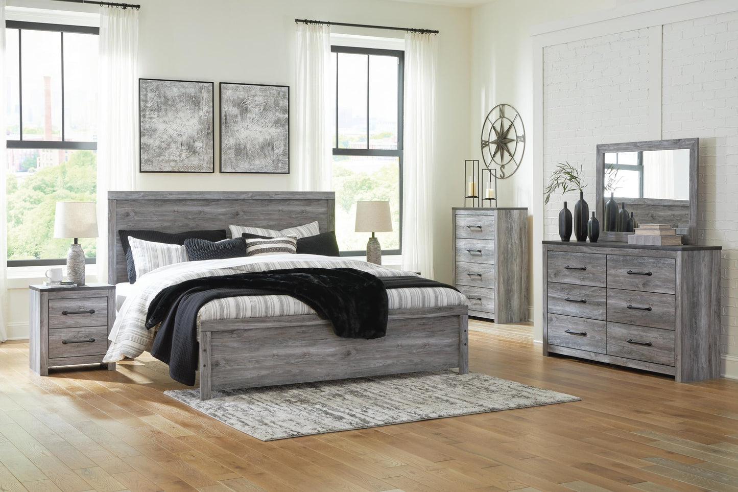 Bronyan King Panel Bed with Mirrored Dresser and Nightstand